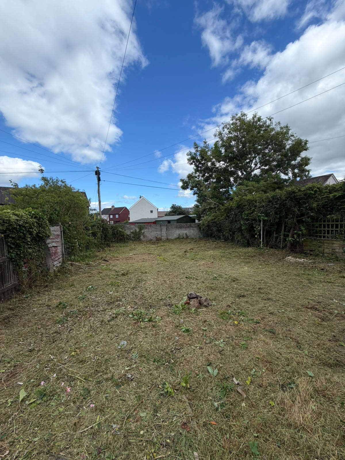 Overgrown Highland back garden fully cleared and cut back to level ground by NS & Sons