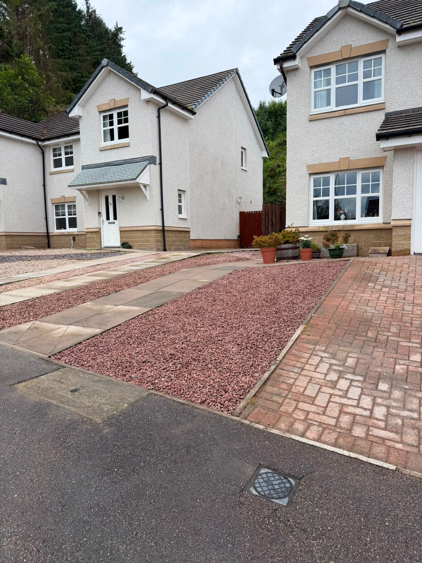 Red gravel path cleared and re-dressed, after